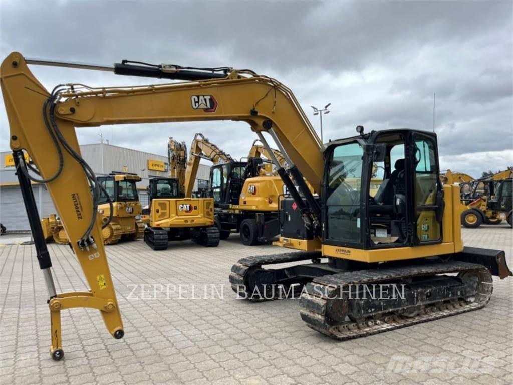 CAT 310 Koparki gąsienicowe