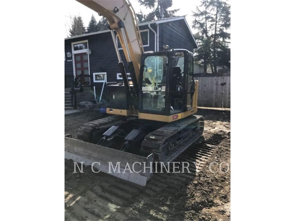 CAT 310 Koparki gąsienicowe