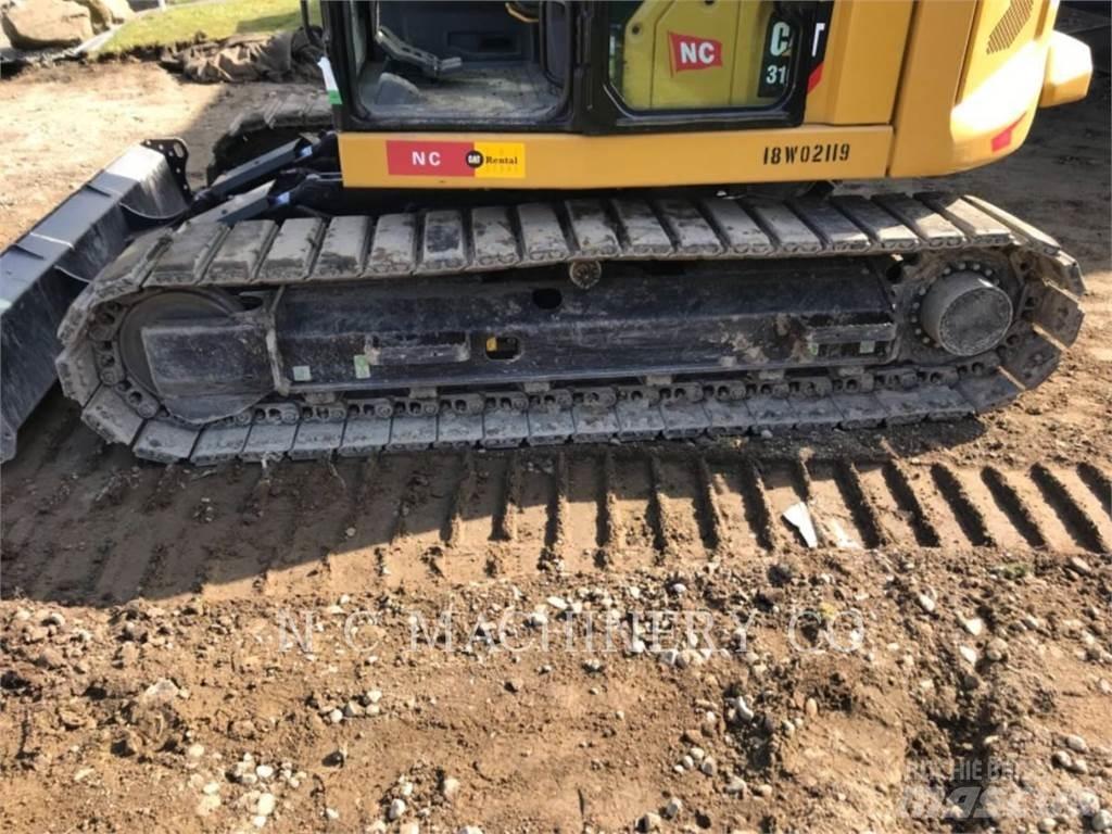CAT 310 Koparki gąsienicowe
