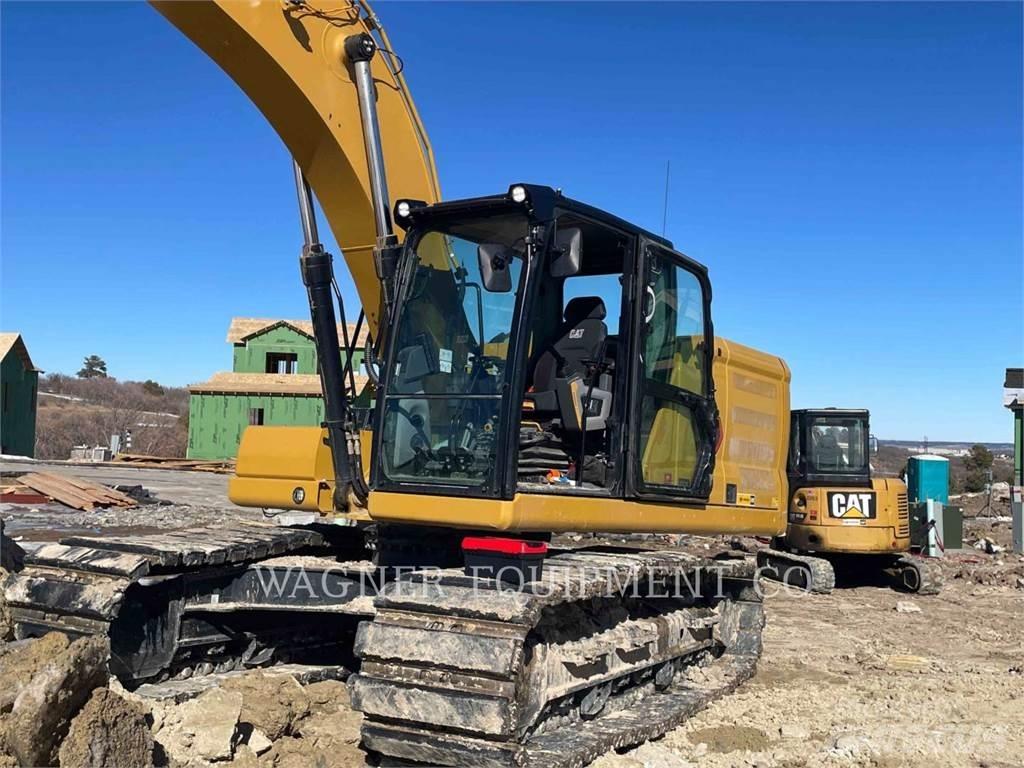 CAT 323 Koparki gąsienicowe