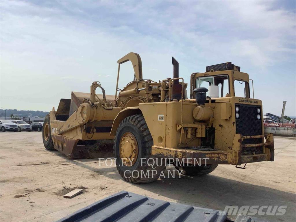 CAT 631D Skrobaki