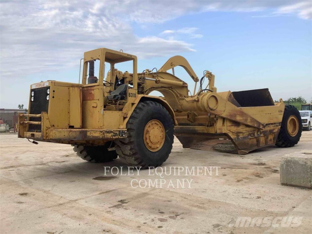 CAT 631D Skrobaki