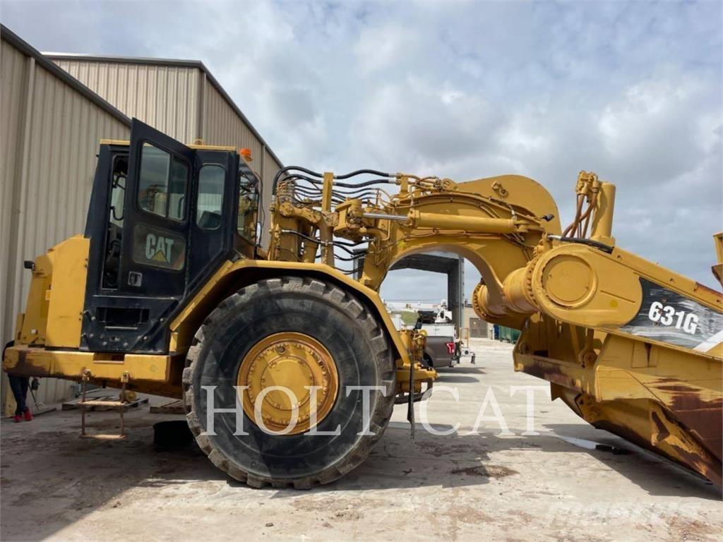 CAT 631G Skrobaki