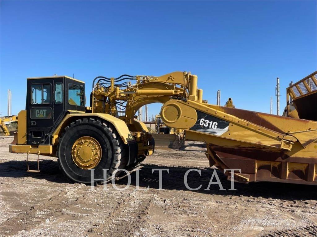 CAT 631G Skrobaki