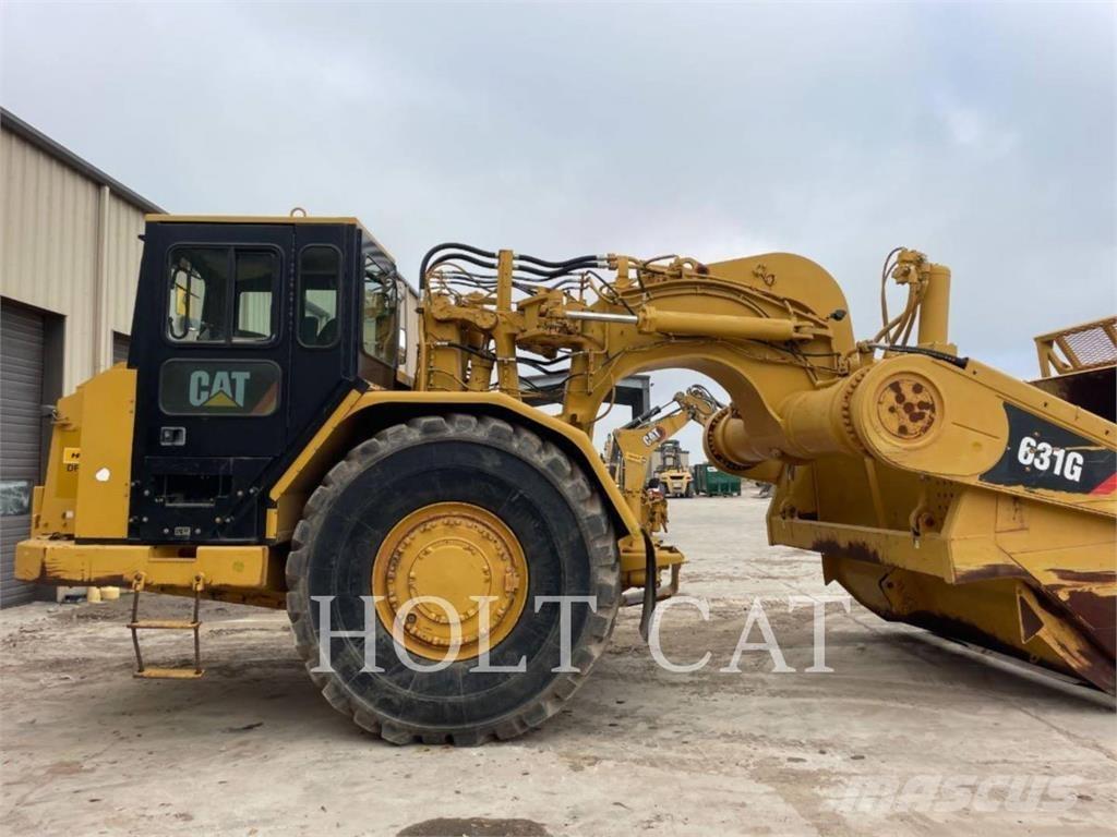 CAT 631G Skrobaki