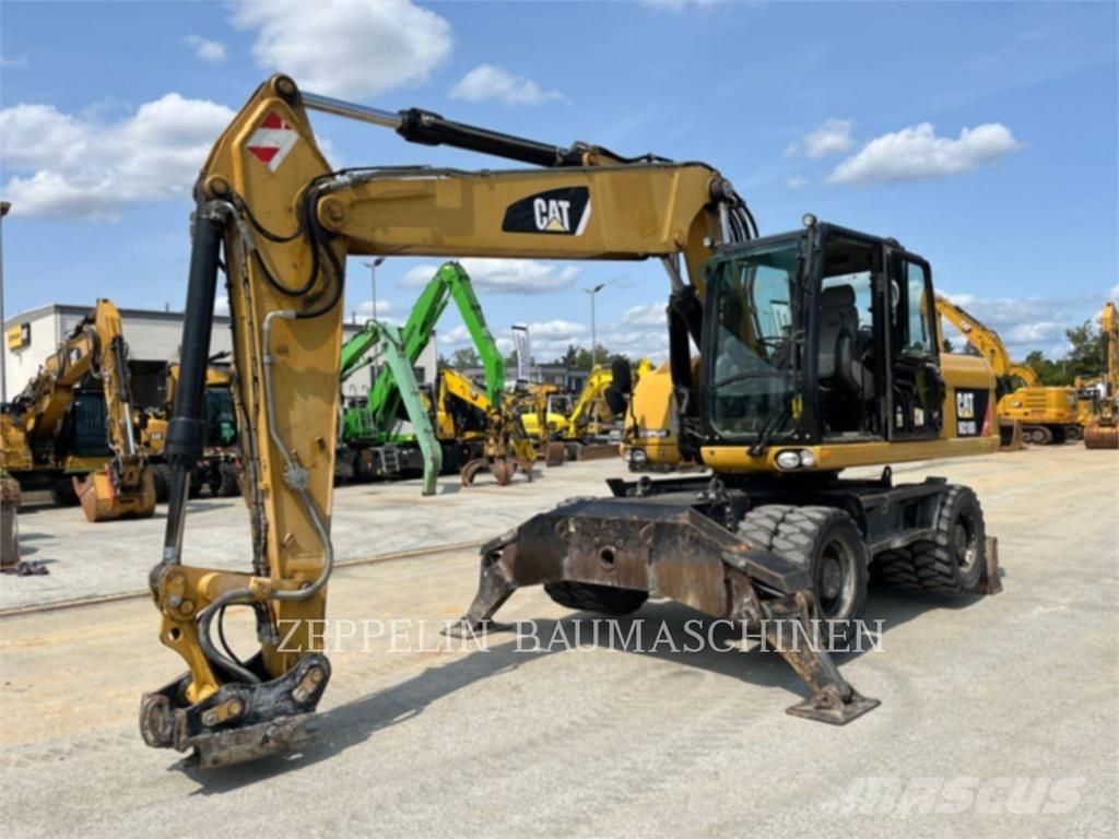 CAT M318D Koparki kołowe