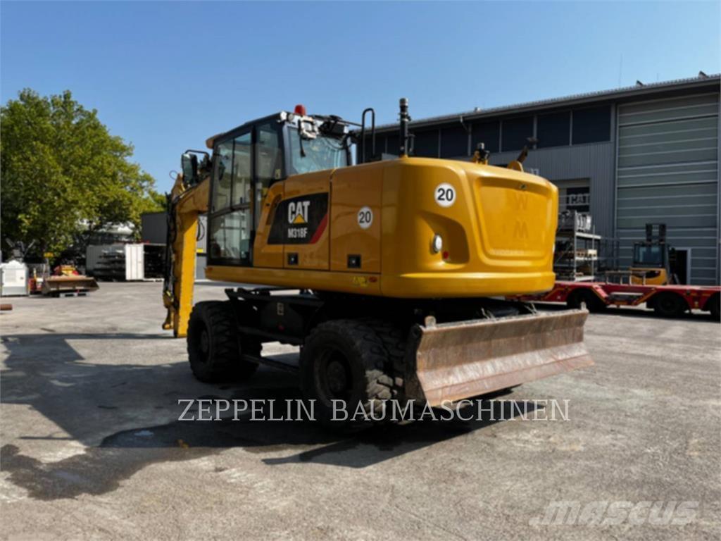 CAT M318F Koparki kołowe