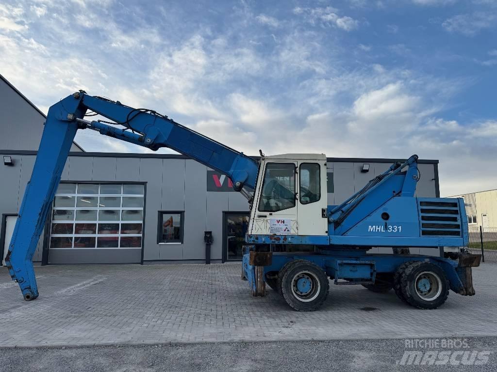 Fuchs MHL 331 Koparki przeładunkowe