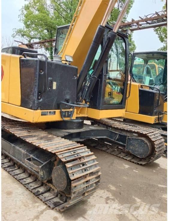 CAT 310 Koparki gąsienicowe