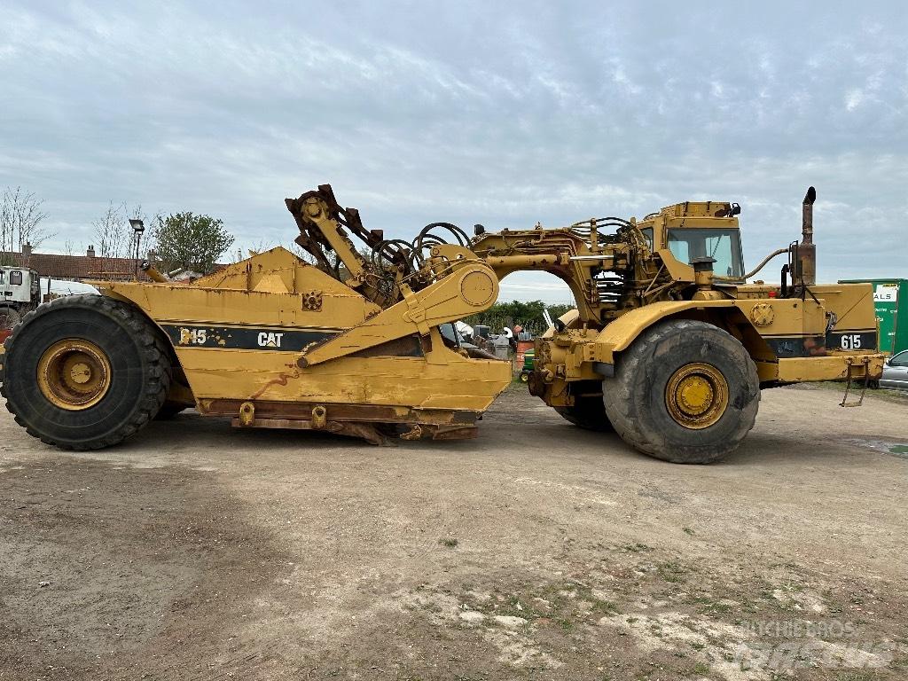 CAT 615 Skrobaki