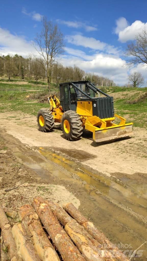 John Deere 640 Skidery