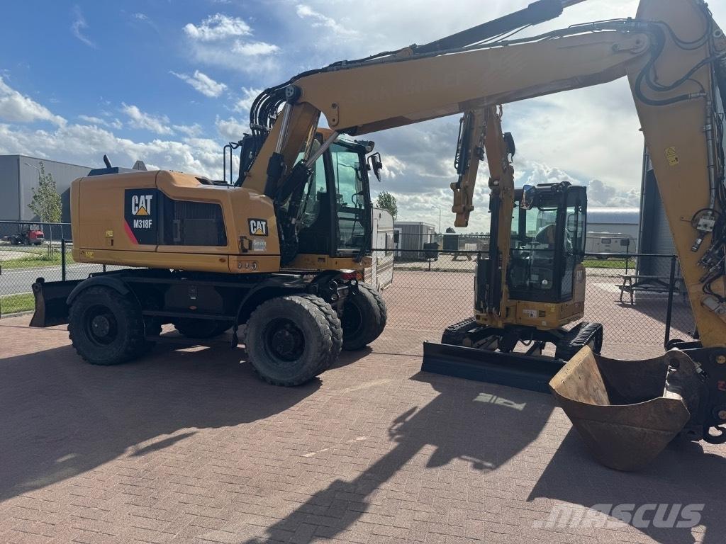 CAT 318 Koparki kołowe