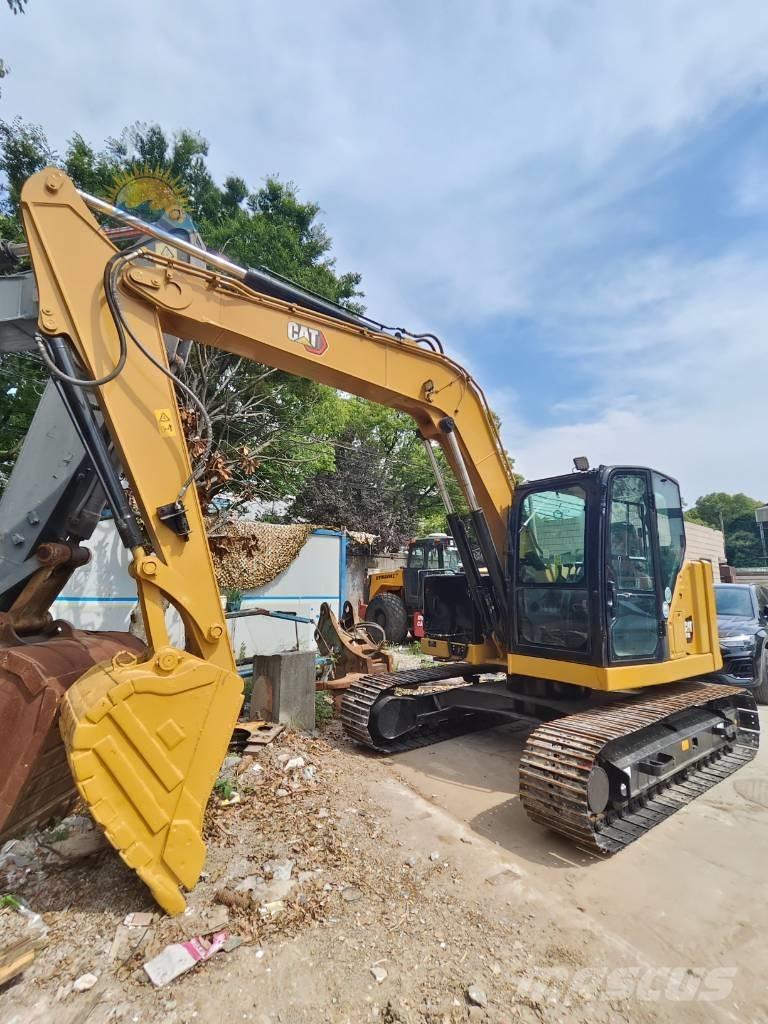 CAT 310 Koparki gąsienicowe