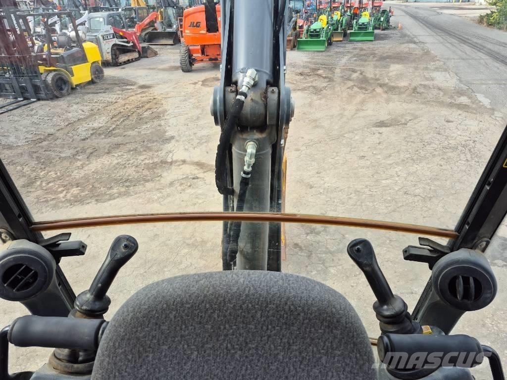 John Deere 310 Koparko-ładowarki