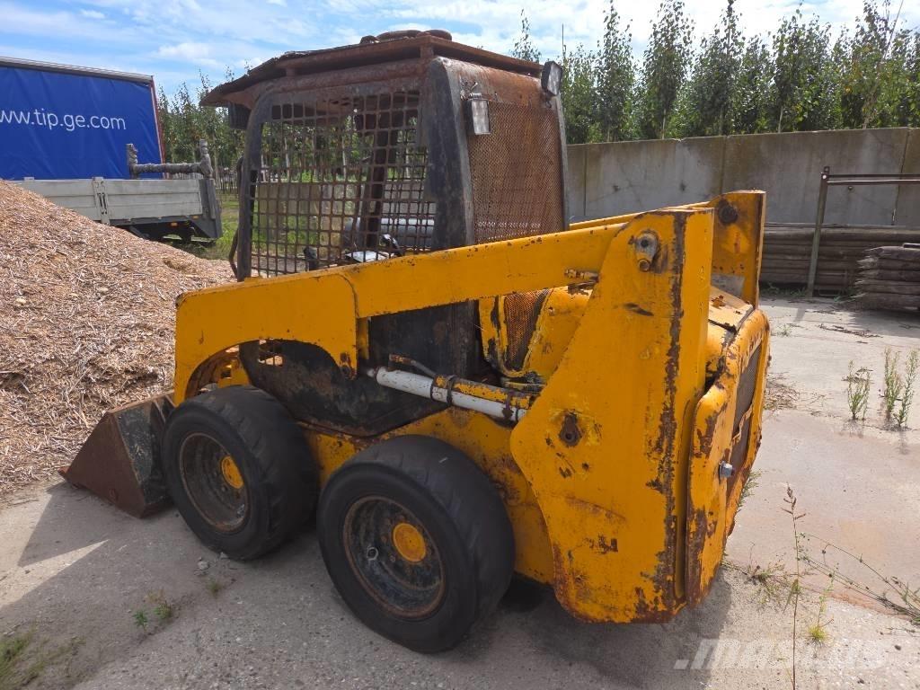 Komatsu SK 714 Ładowarki burtowe