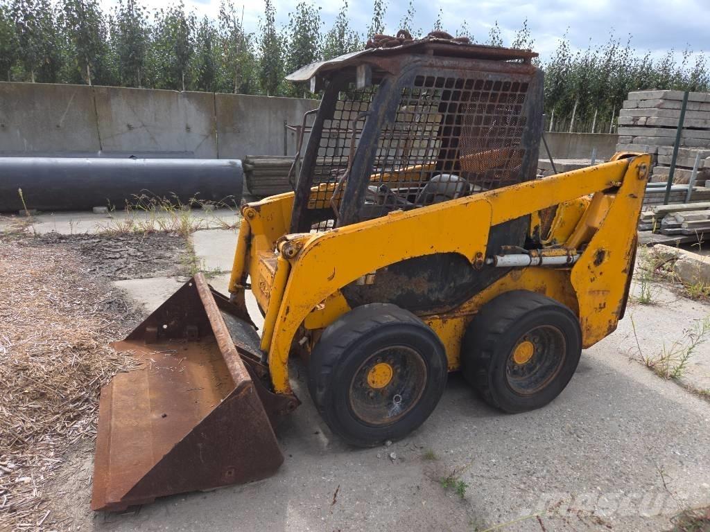 Komatsu SK 714 Ładowarki burtowe