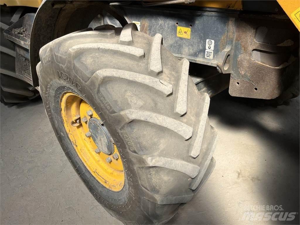 Fermec 860 Koparko-ładowarki
