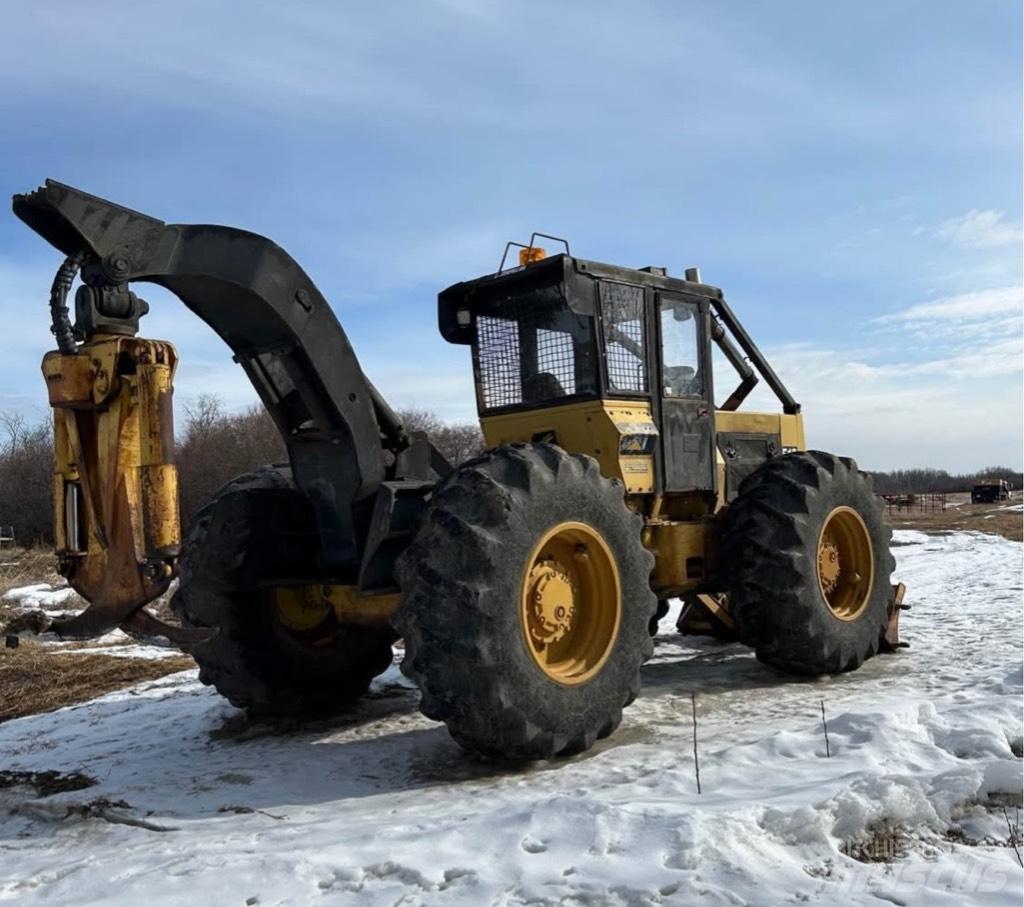 CAT 518 Skidery