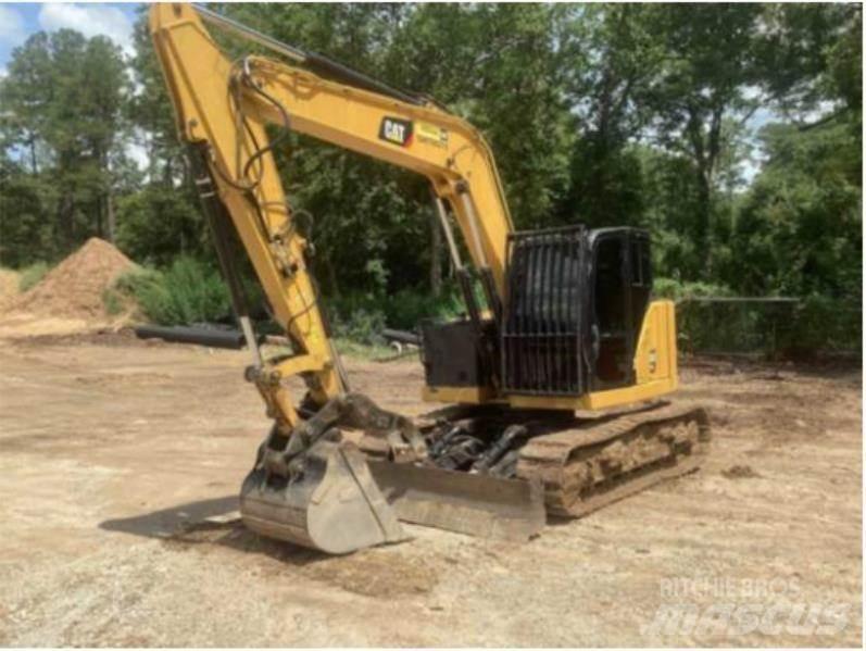 CAT 310 Koparki gąsienicowe