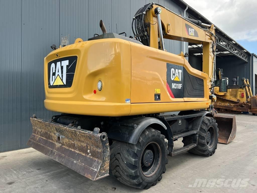 CAT M318F Koparki kołowe