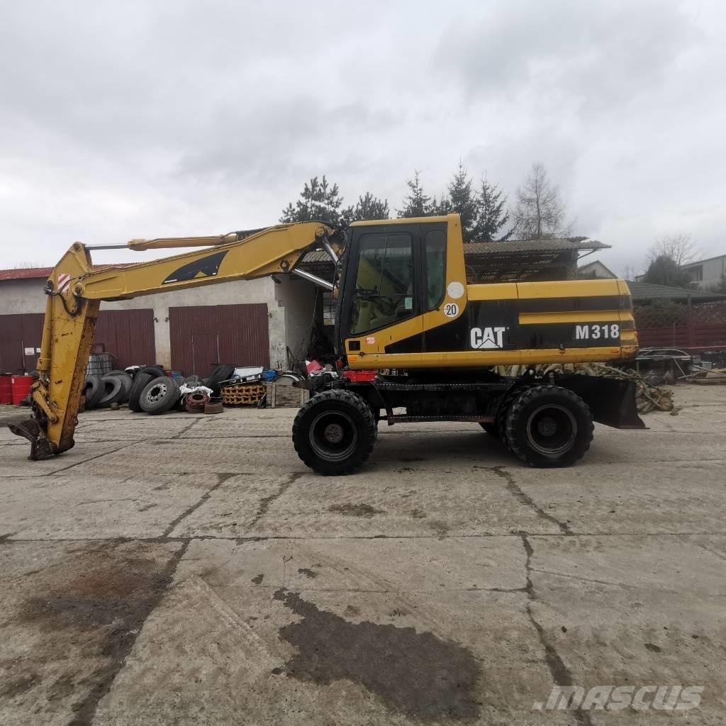 CAT M 318 B Koparki kołowe