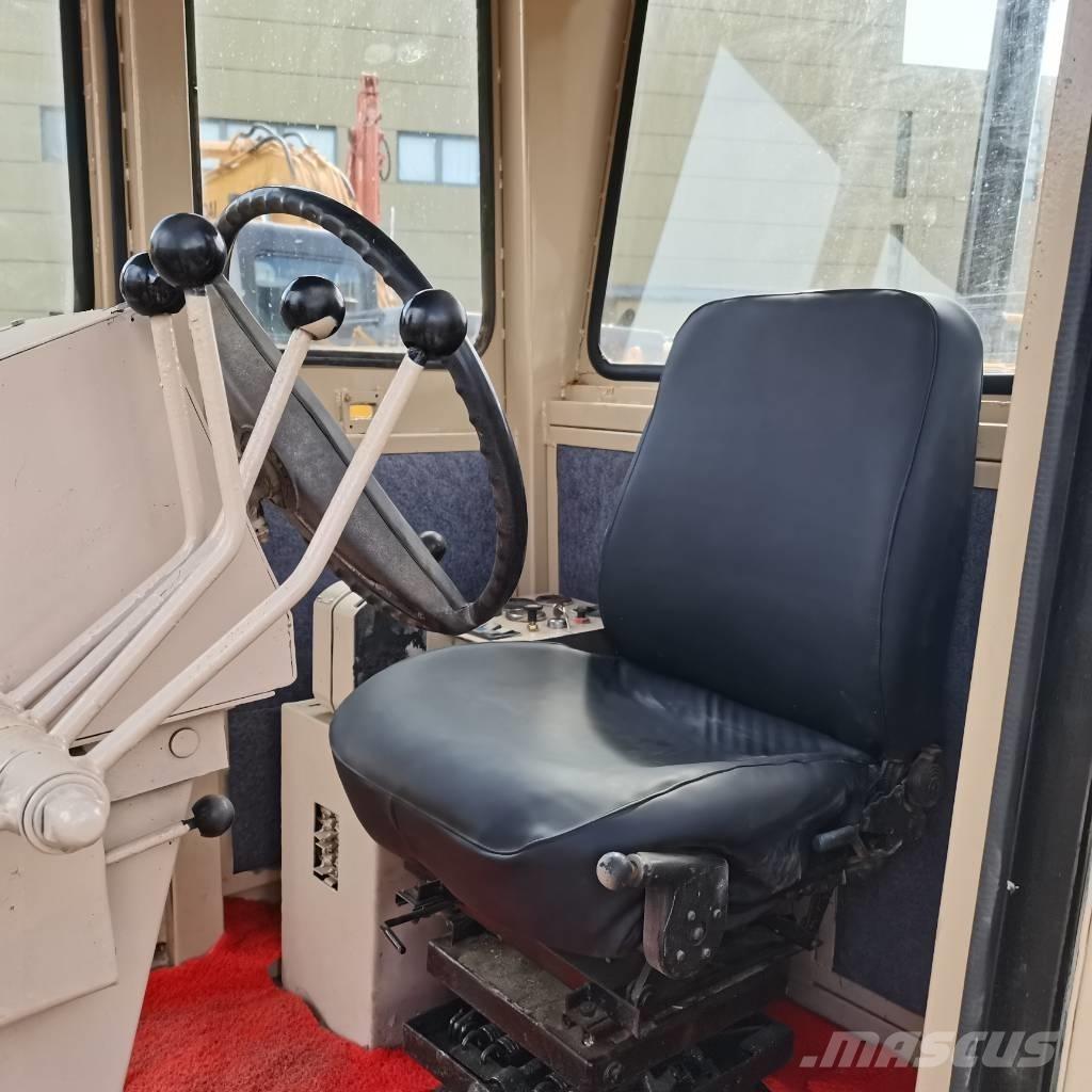 CAT 140k Równiarki
