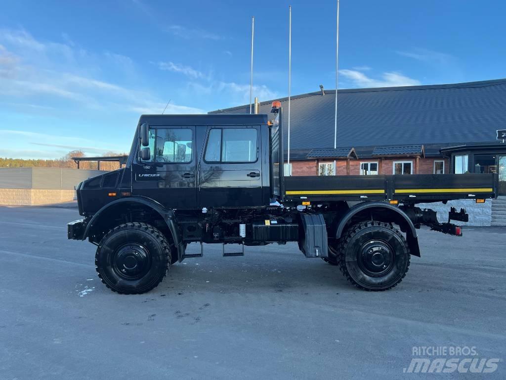 Mercedes-Benz Unimog Ciężarówki typu Platforma / Skrzynia