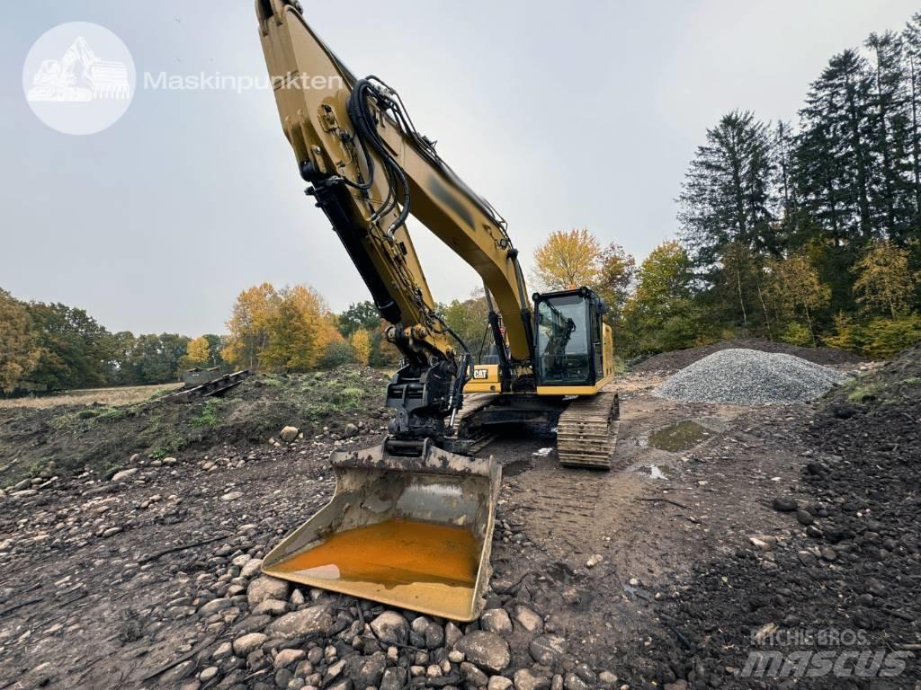 CAT 323 Koparki gąsienicowe
