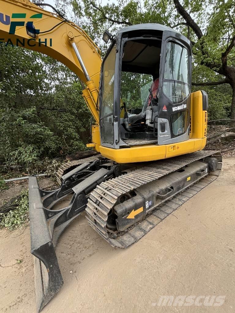 Komatsu PC128US Koparki gąsienicowe