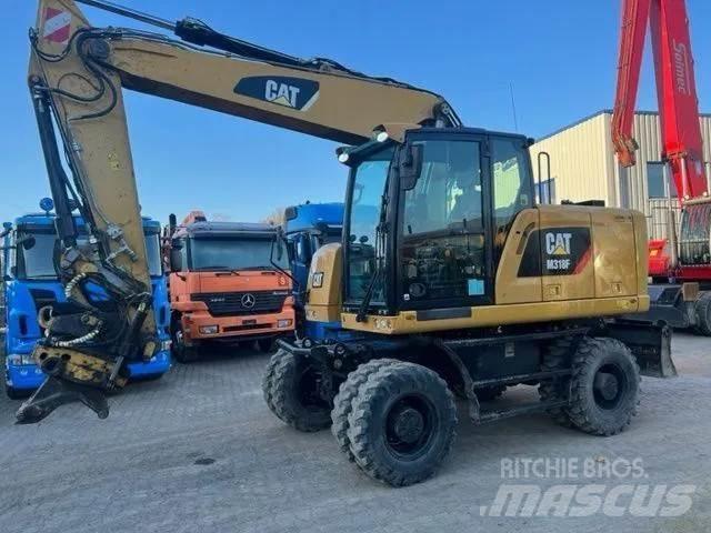 CAT M 318 F Koparki kołowe