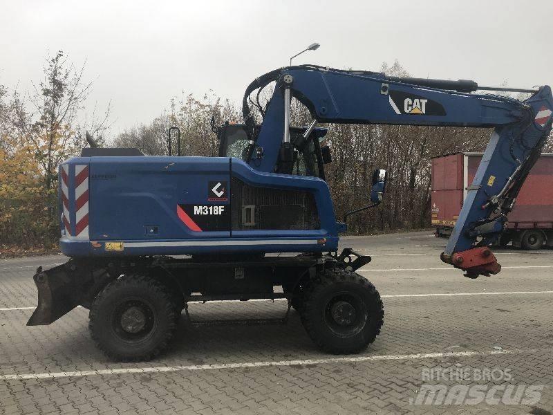 CAT M318F Koparki kołowe