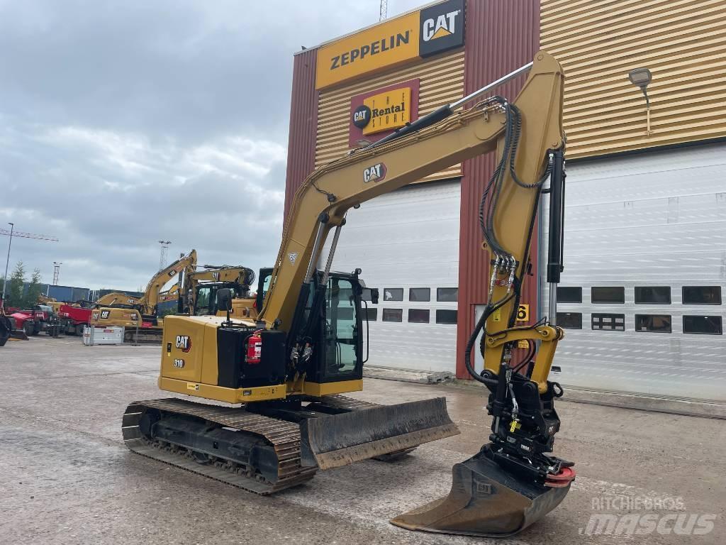 CAT 310 Koparki gąsienicowe