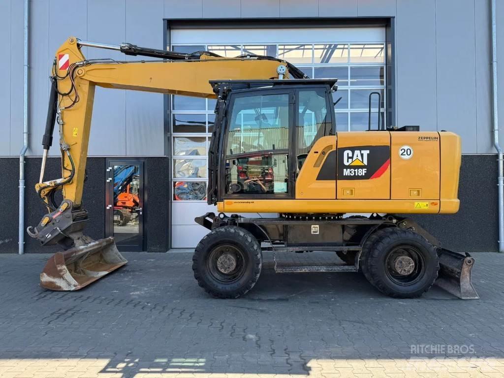 CAT M318F Koparki kołowe