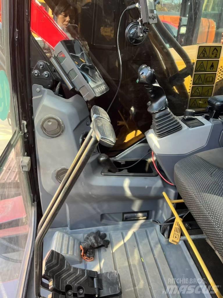 CAT 310 Koparki gąsienicowe