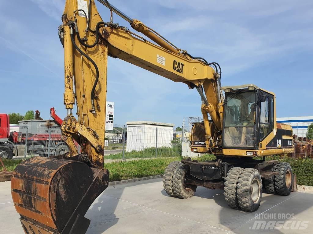CAT M 318 Koparki kołowe