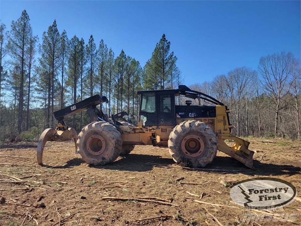 CAT 545C Skidery