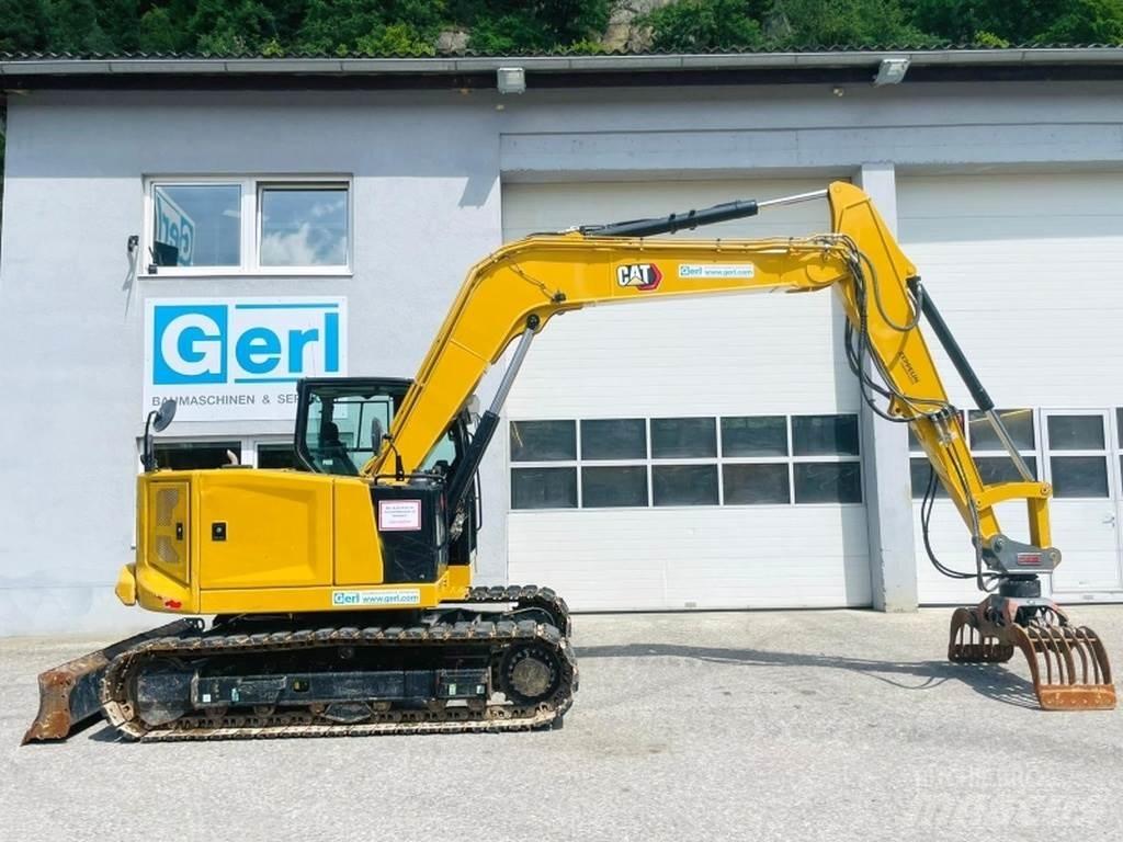 CAT 310 Minikoparki