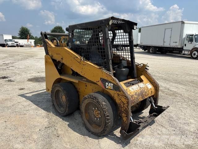 CAT 242B3 Ładowarki burtowe
