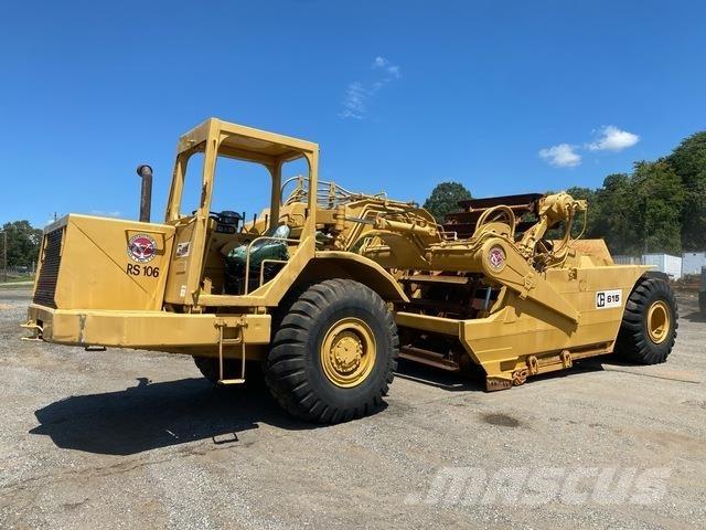 CAT 615 Skrobaki