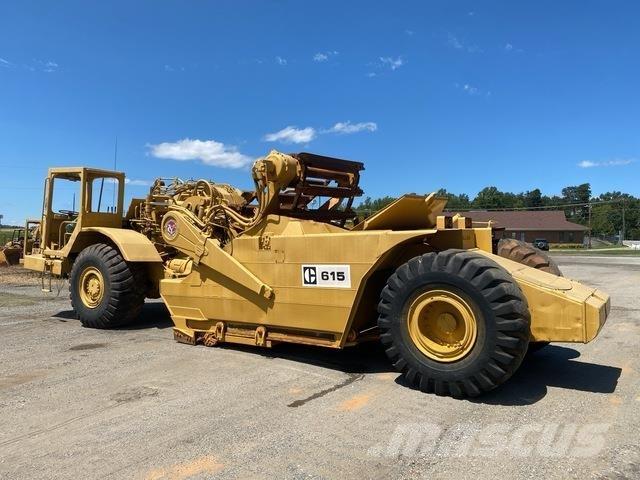 CAT 615 Skrobaki