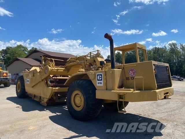 CAT 615 Skrobaki