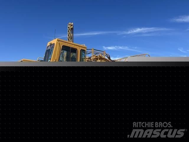 CAT 633E Skrobaki