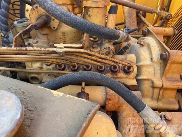 CAT 651E Skrobaki