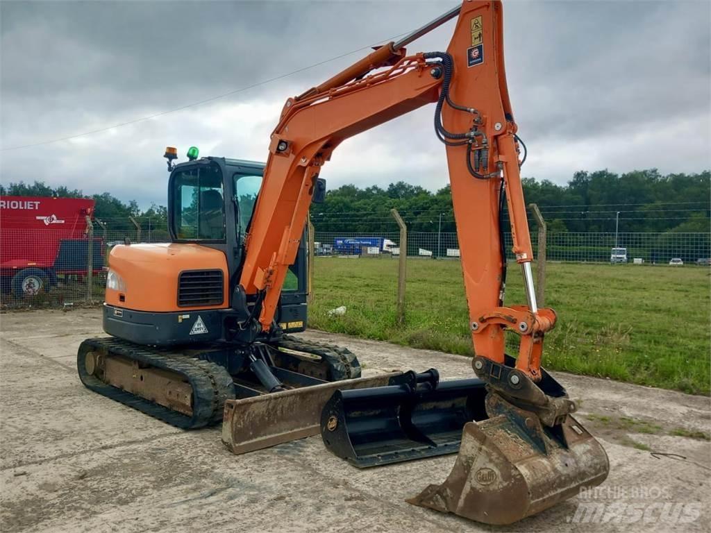 Develon DX63 Maszyny rolnicze - Inne