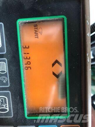 John Deere 590 Prasy zwijające