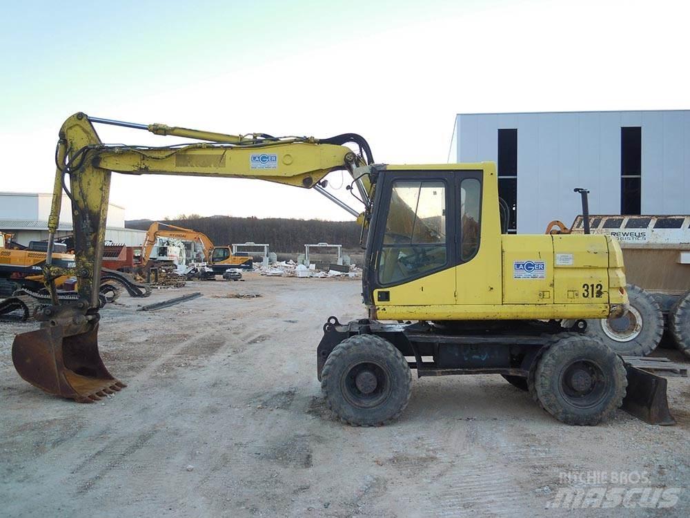 CAT M312 Koparki kołowe