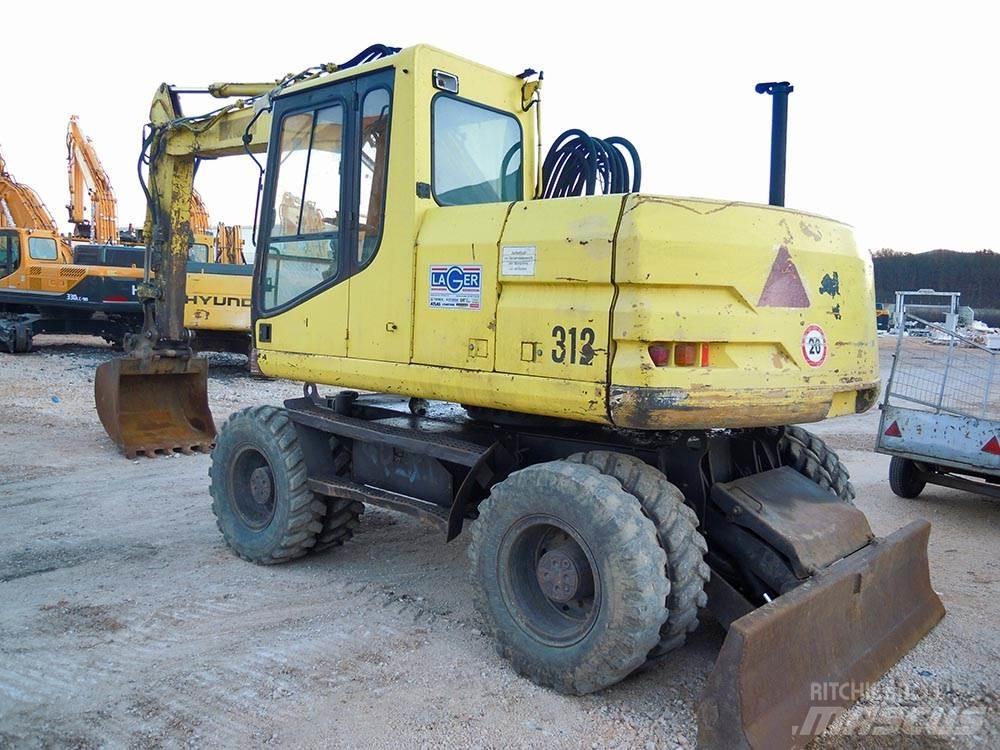 CAT M312 Koparki kołowe