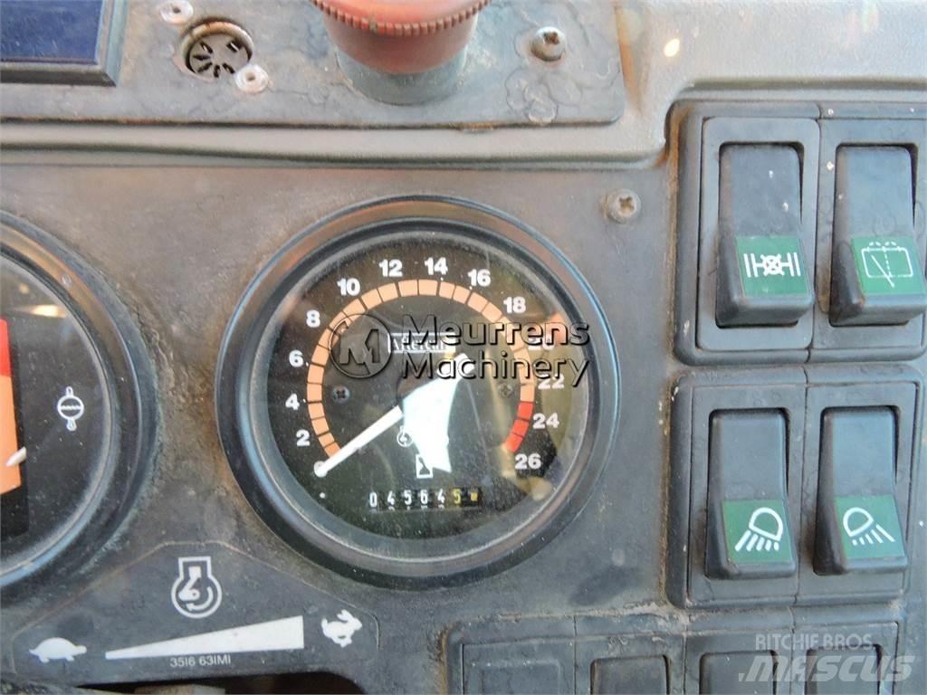 Fermec 965 Koparko-ładowarki