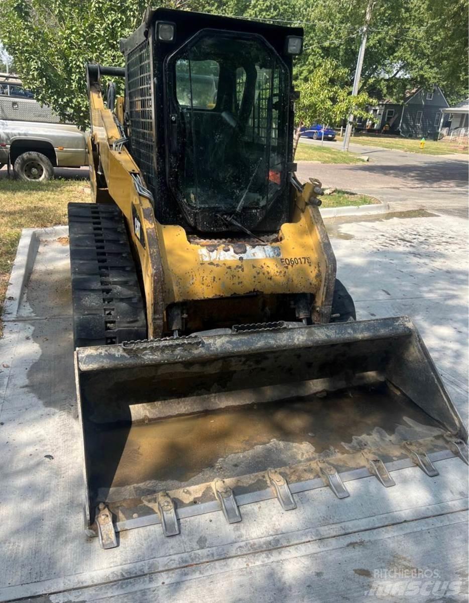 CAT 259B3 Ładowarki burtowe