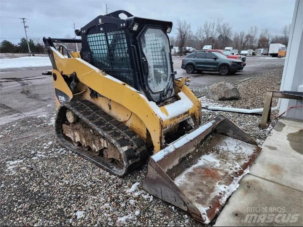 CAT 259B3 Ładowarki burtowe